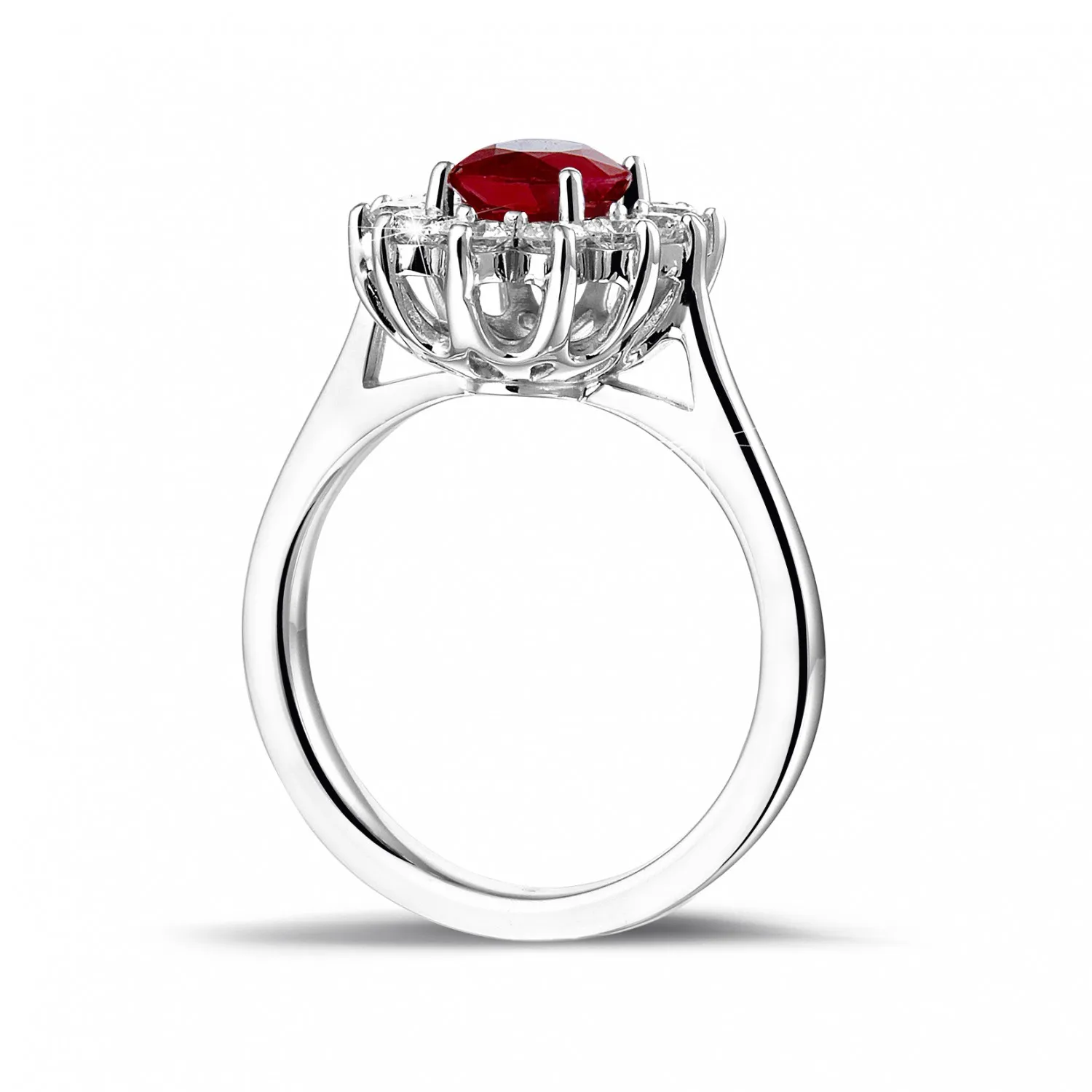 Anillo « entourage » en oro blanco con rubí ovalado y diamantes redondos 
