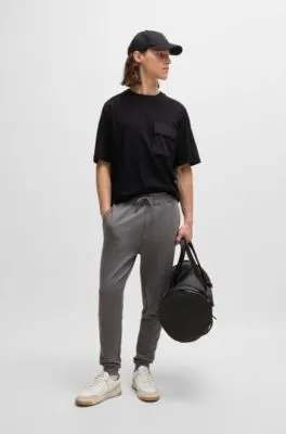 Camiseta de punto de algodón con bolsillo cargo de la marca