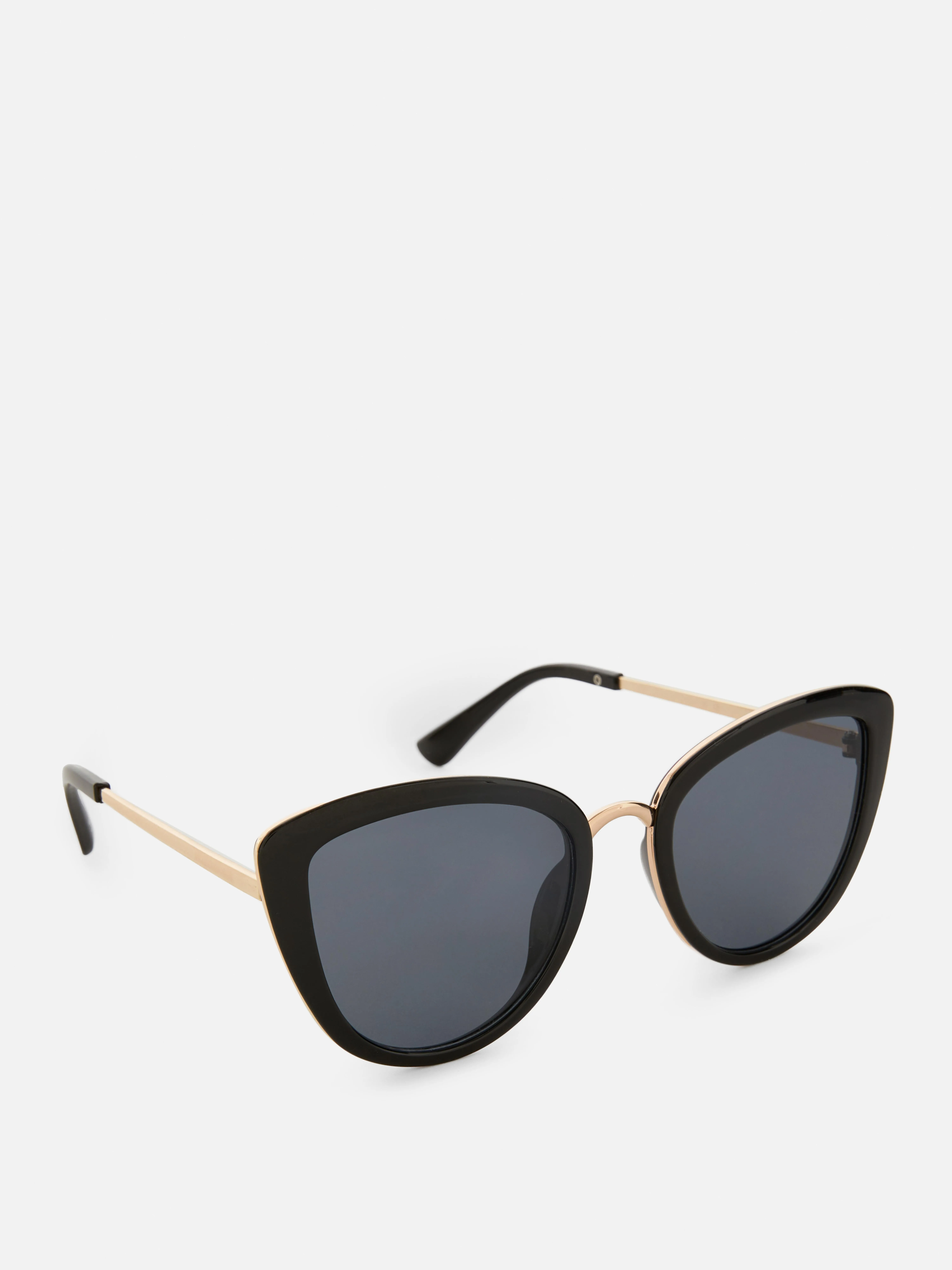 Gafas de sol estilo ojos de gato con ribete metálico
