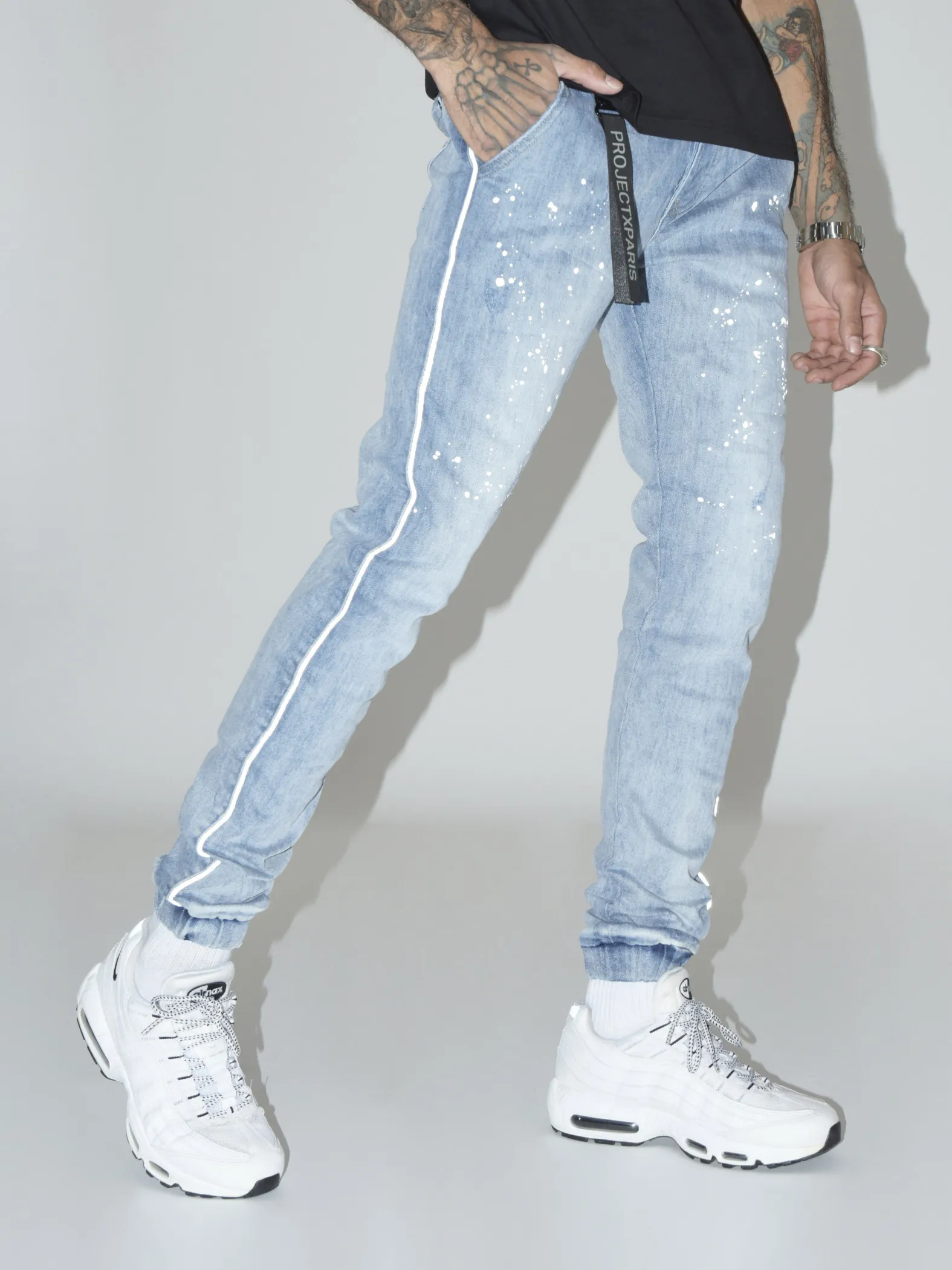 Jeans con ribete reflectante