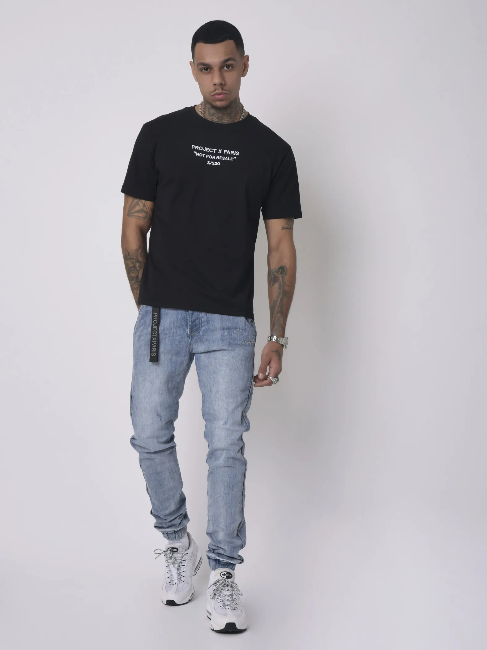 Jeans con ribete reflectante