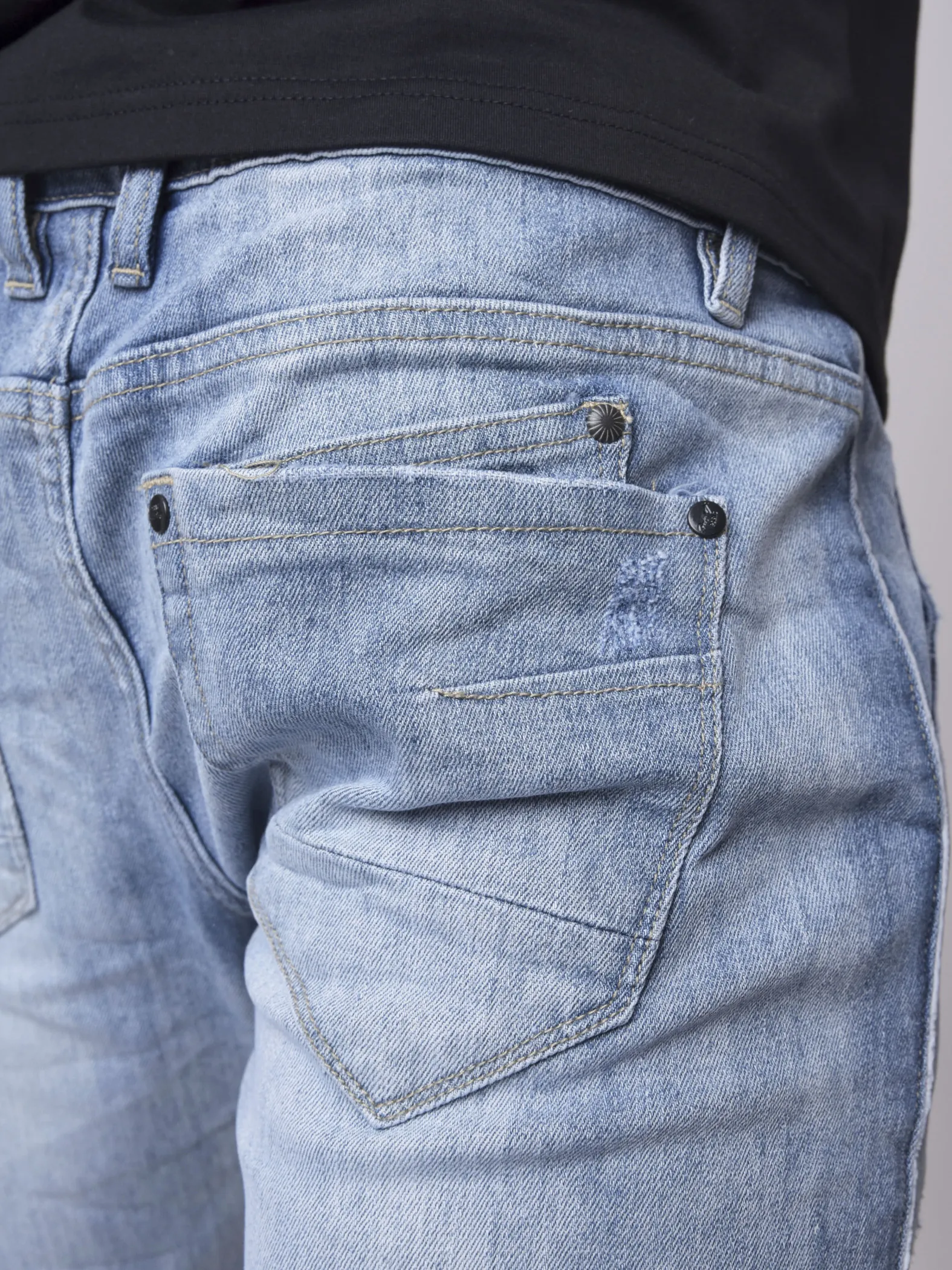 Jeans con ribete reflectante