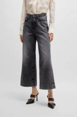 Jeans de pernera ancha en denim rígido negro
