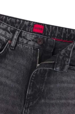 Jeans de pernera ancha en denim rígido negro
