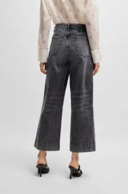 Jeans de pernera ancha en denim rígido negro