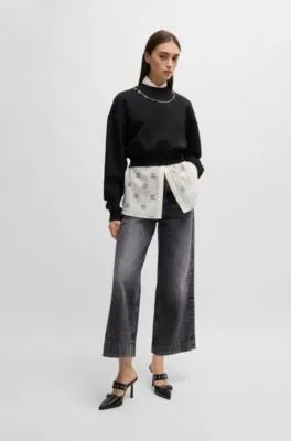 Jeans de pernera ancha en denim rígido negro