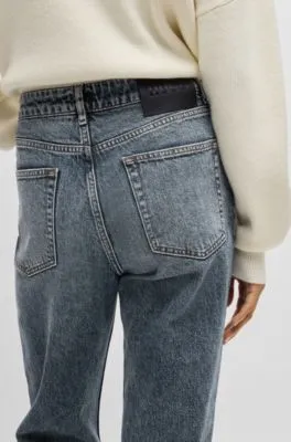 Jeans estilo mom tapered fit de denim elástico azul oscuro