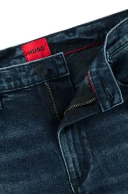 Jeans extra slim fit de denim elástico azul oscuro