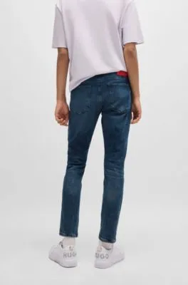 Jeans extra slim fit de denim elástico azul oscuro