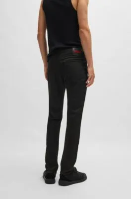 Jeans extra slim fit de denim elástico negro