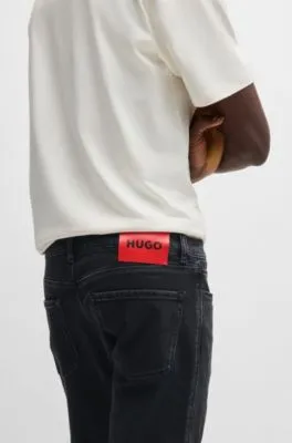 Jeans extra slim fit en denim negro de tacto suave