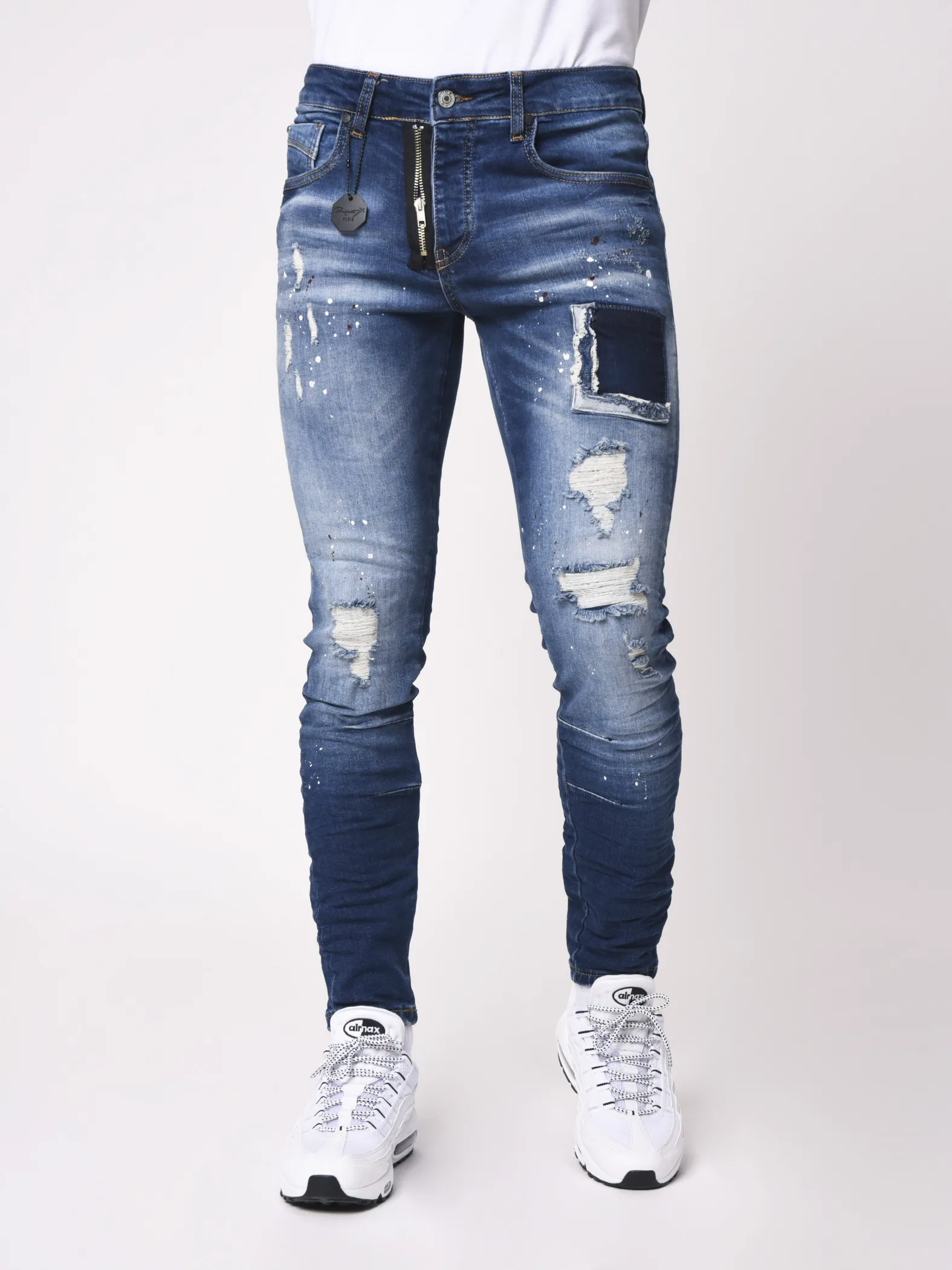 Jeans pitillo con manchas