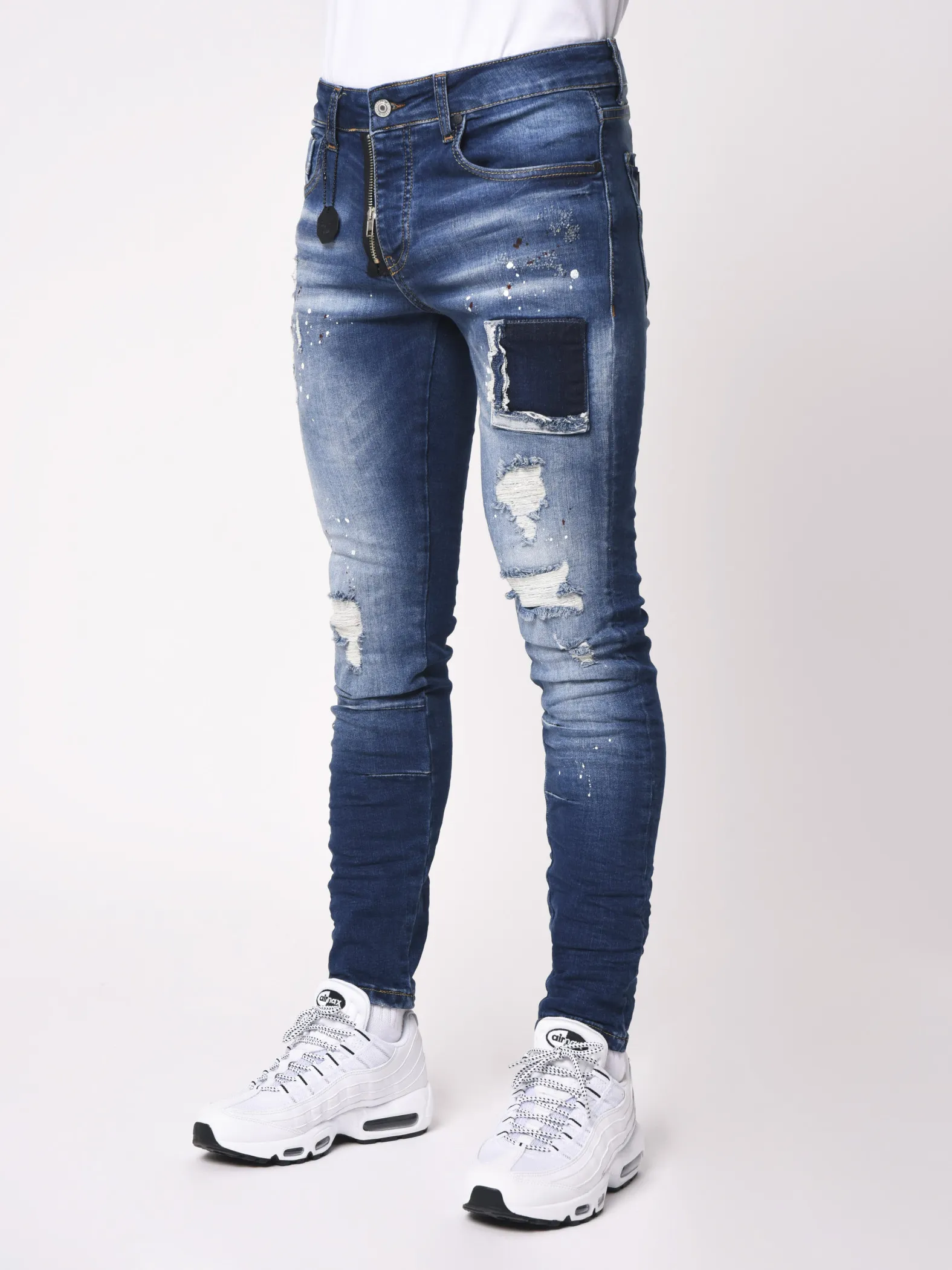 Jeans pitillo con manchas