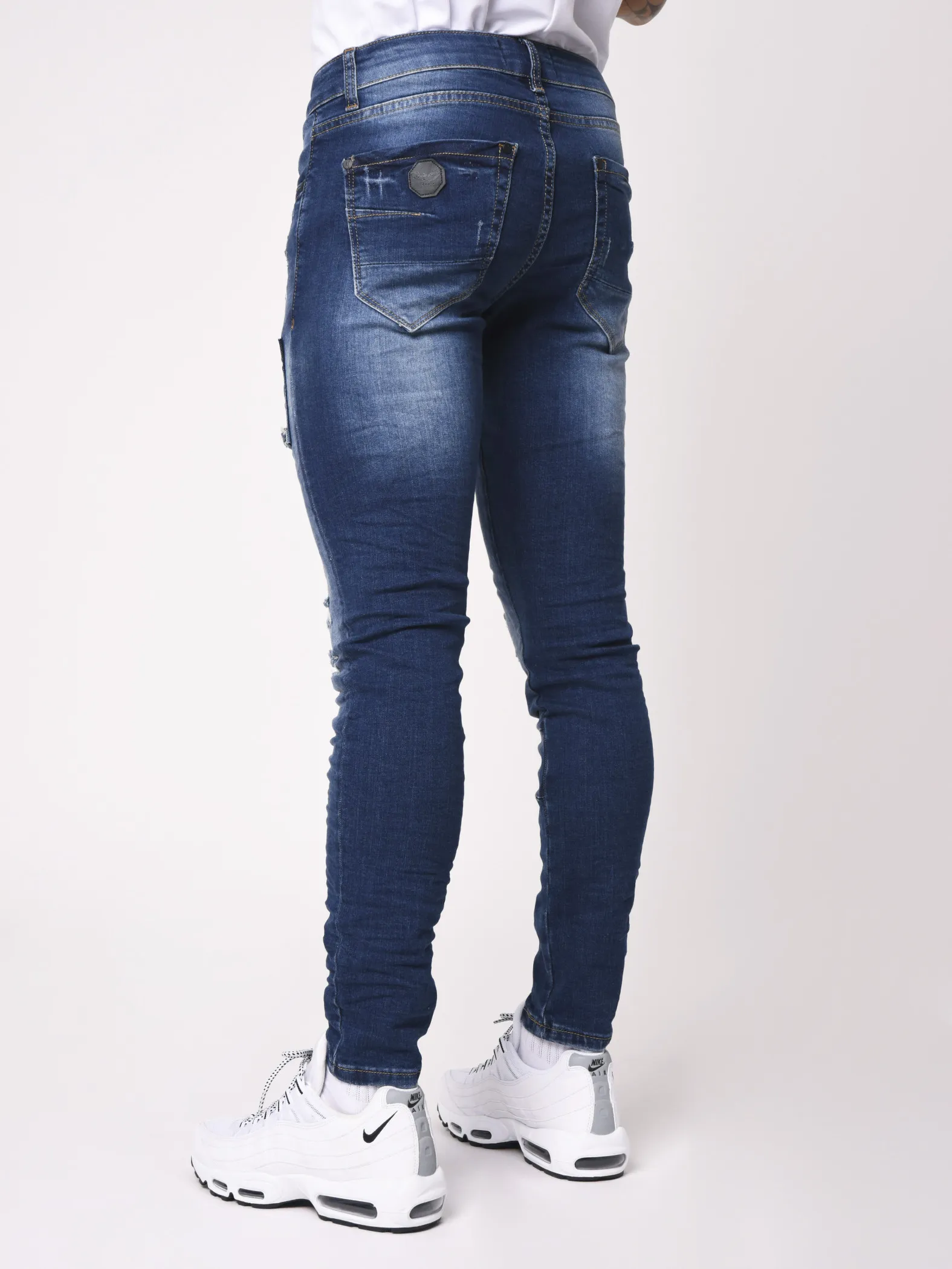 Jeans pitillo con manchas