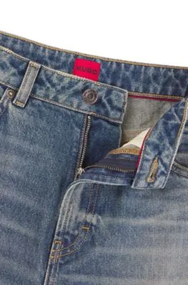 Jeans relaxed fit de denim azul con efecto teñido
