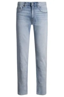 Jeans slim fit de denim azul lavado a la piedra