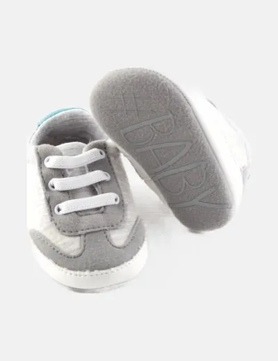 Sfera Primeros pasos gris detalle cordones