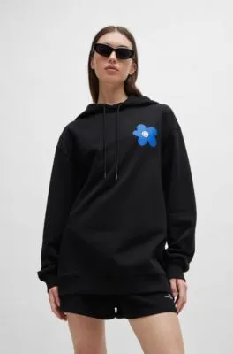 Sudadera con capucha para todos los géneros en felpa de algodón con estampado de flores y logos