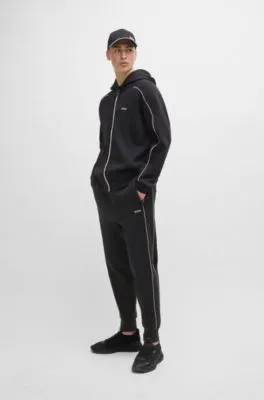Sudadera con capucha y cremallera de algodón elástico con ilustración grabada